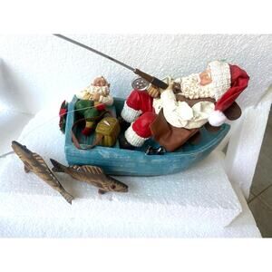 Possible Dreams Santa "On Christmas Pond" figurine, which features Santa fishing